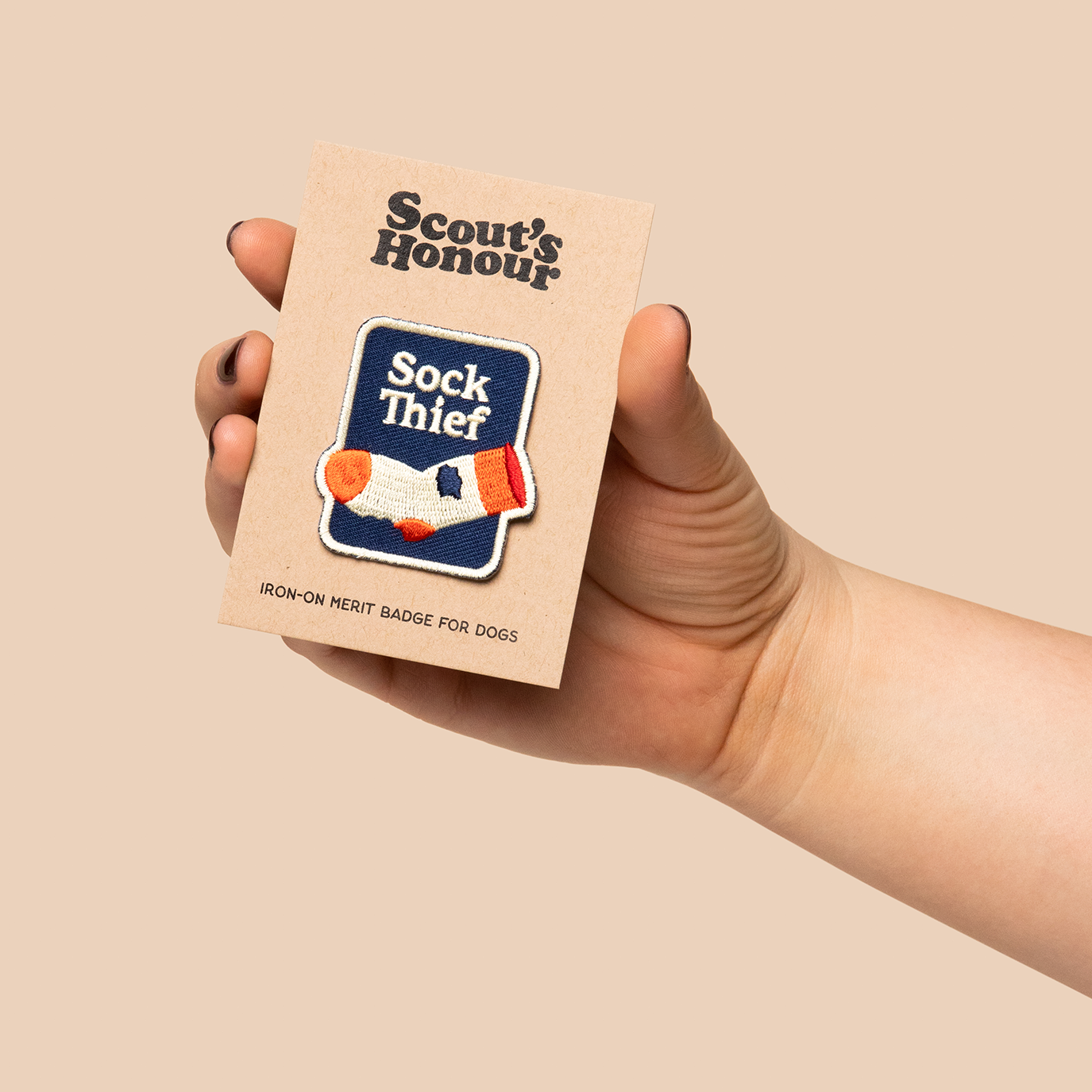 Scout's Honour Sock Thief -silitettävä kangasmerkki koiralle